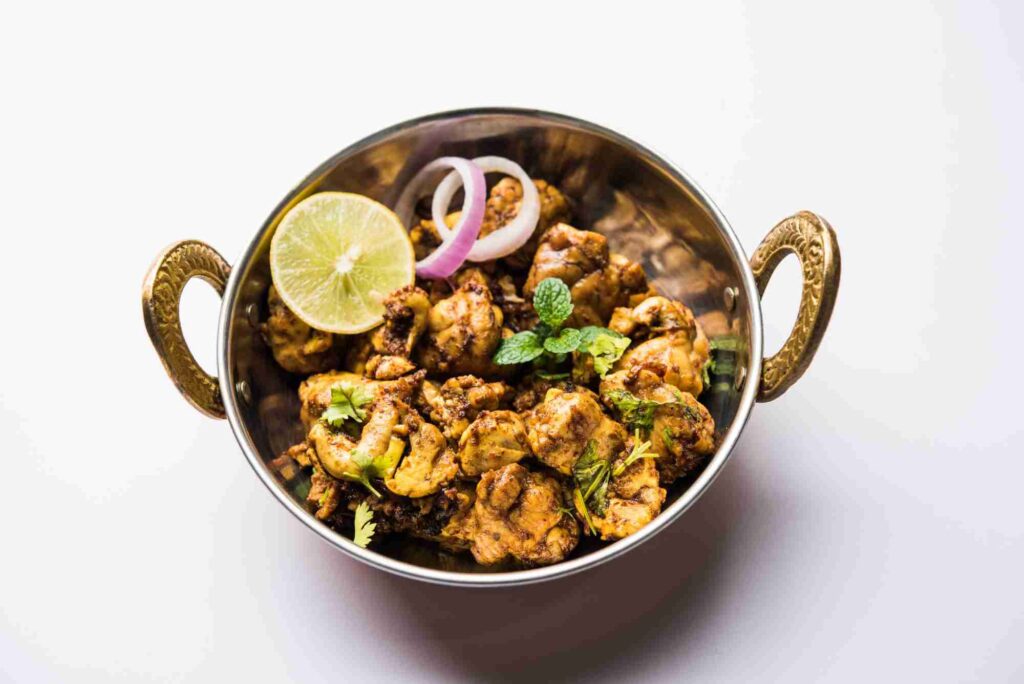 brain-bheja-fry-goat-sheep-lamb-is-popular-indian-pakistani-dish-cooked-bakra-eid-eid-ul-zuha-served-karahi-pan-plate-selective-focus-scaled-2